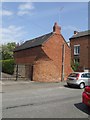 Corbelled building in Willington Road in DE6 6HY