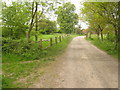 Footpath junction on Couch House Farm access road in TN8 5LQ