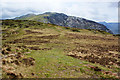Looking along the ridge path with the cliffs of Gallt yr Ogof and Yr Foel Goch beyond in Capel Curig Community