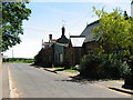 High Street approaching Church Lane, Tittleshall in Tittleshall