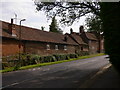 Farm buildings at the north west corner of Binscombe in GU3 1JF