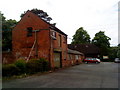 Former farm buildings at Northfield Manor Farm in B31 1LD