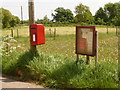 Buckland Ripers: postbox № DT3 105 and noticeboard in DT3 4BS