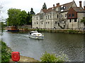Pleasure boat passing the Archbishop's Palace, Maidstone in ME16 8JH