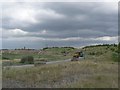 Road by reclaimed opencast colliery, Kirkthorpe in WF1 5TH