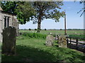 Through the churchyard on to the Marsh, Snargate, Kent in TN29 0EN