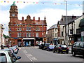 High Street and Clock Tower, Newtown, Powys in SY16 1ET