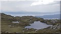Lochan near the summit of Sgurr Eireagoraidh in PH41 4QN