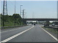M6 motorway - M62 sliproad approaching the A574 overbridge in WA3 6LT