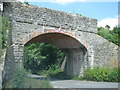 Disused railway bridge spans road at Bawdrip in TA7 8QE