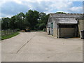 Farm buildings at the end of Hurlands Lane in GU8 4NT