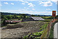 Old farm buildings next to the site for the new A470 trunk road in LD2 3RW