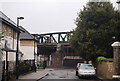 Railway bridge at the end of Conyers Rd in SW16 5AP