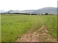 View eastwards across farmland towards Carn Boduan hill in Nefyn Community