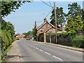 B1153 road through the village of Grimston in PE32 1BG