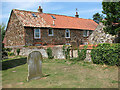Cottage north of St Botolph's church, Grimston in PE32 1BG