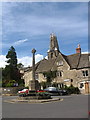 Minchinhampton War Memorial and Holy Trinity Church in GL6 9LF