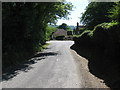 Sharp bend in Heyshott village in GU29 0DN