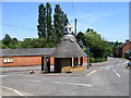 Telephone kiosk and bus stop, Hollowell in Hollowell