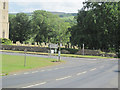 Road junction by church in DL8 4HJ