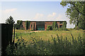 Curious derelict building on byway north of Jervoise Farm in SP5 4LL