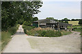 Farm buildings and footpath to Throope Manor House in SP5 4AR