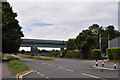 A48 and railway bridge carrying disused line to derelict Propellant factory in NP26 5NN