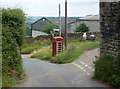 Lane junction with telephone box on Alton Hill in S42 6AW