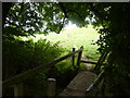 Stone footbridge over a brook at Wingerworth in S42 6RE