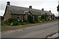 Roadside cottages at West Ardler in PH13 9EZ