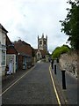 Looking up Upper Church Lane towards St Andrew's in GU9 7DT