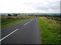 Minor road over Shaw Hill in NE47 9LS
