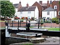Lock gates and houses at Severn Side, Stourport in DY13 0HZ