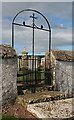 Gate, St Ninian's Cemetery in AB56 5HD