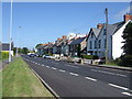 Houses along the A487 in the village of Dinas Cross in SA42 0UW