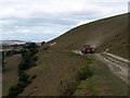 Farm vehicle climbing Bincombe Hill in DT3 6NL