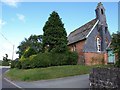 Church next to the A483 in Dolfor in SY16 4BN