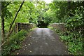 A bridge over the old railway track on Castle Lane near Knowle in EX33 1HW
