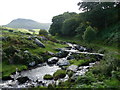 Slab bridge across the Afon Arthog below Llys Bradwen in LL39 1DQ