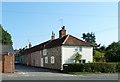 Looking from The Street into Bakers Lane in IP17 3AA