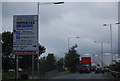 Southern Perimeter Road, Heathrow Airport, approaching the Sandringham Road junction in TW19 7JX