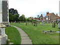 Church of St Edmund, Southwold: walking the dog in the churchyard in IP18 6BE