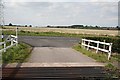 Cattle grid and track from Clarborough Hill Farm in DN22 9LL