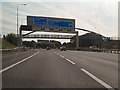 M60, Sign Gantry and Footbridge, Northern Moor in M23 0HA
