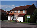 Houses at the junction of Beaumaris Close and Parkhill Drive in CV5 7PQ