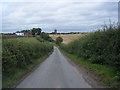 Thorneyfields Lane with Thorneyfields Farm on the left in ST18 9BQ