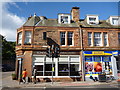 East Lothian Townscape : Running For Cakes on Main Street, Gullane in Gullane