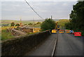 Retaining wall works on Grains Road in OL3 5RL