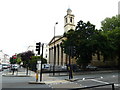 Looking across Hobart Place towards St Peter's in SW1X 8AS