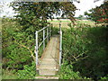 Footbridge near Folkestone Race Course in TN25 6JQ